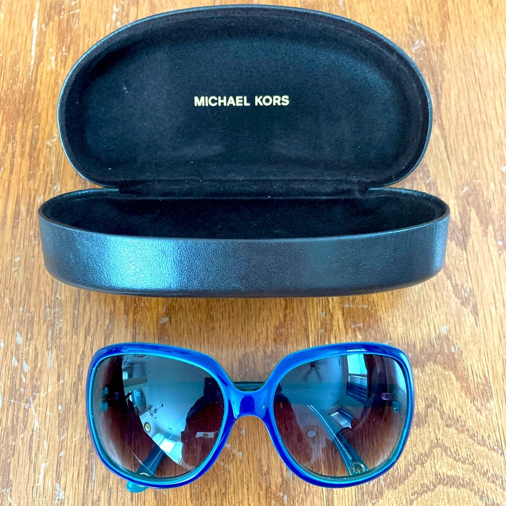 Michael Kors Avilla Sunglasses with leather case. Color Blue/Turquoise
